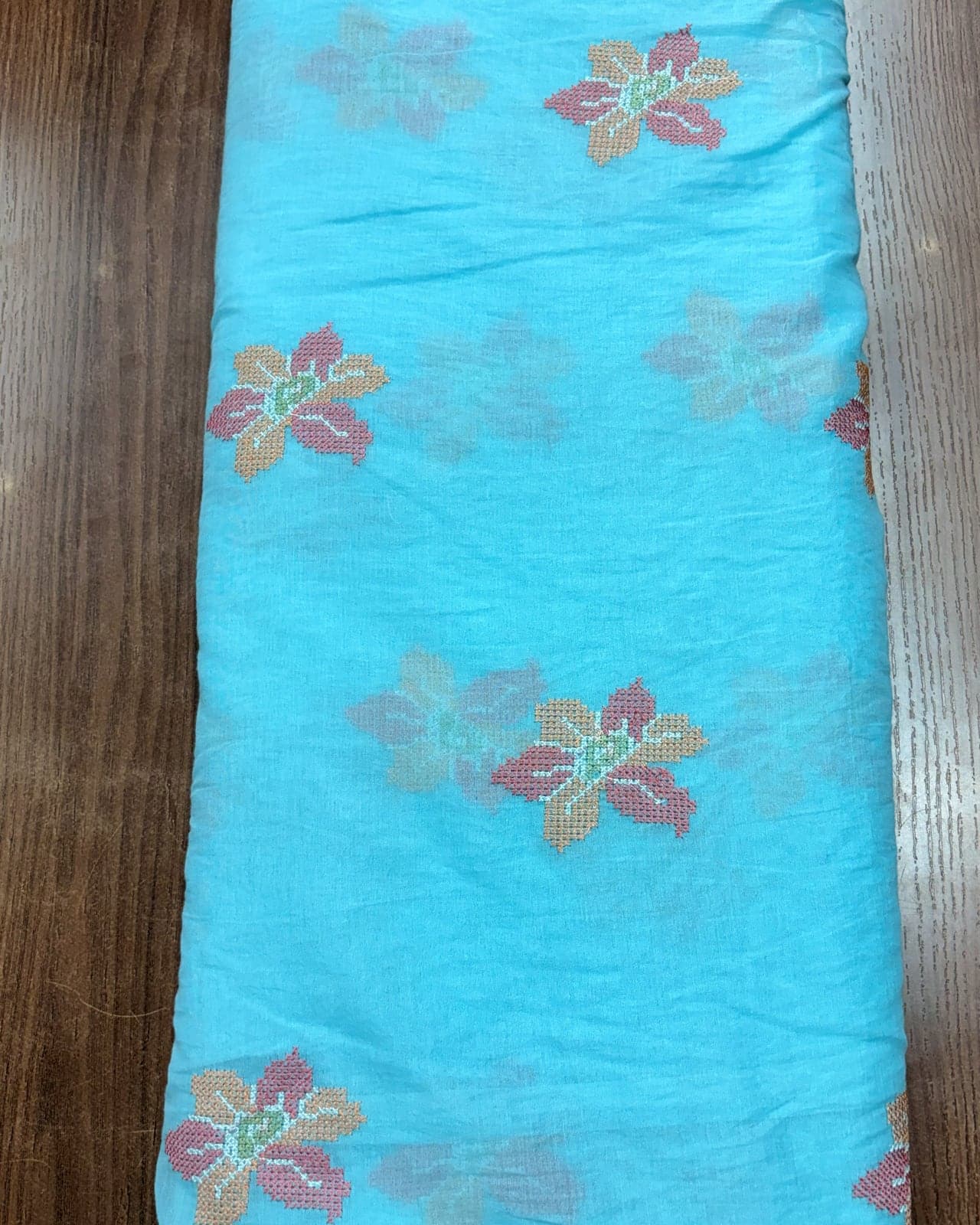 Sky blue chiffon with floral butta