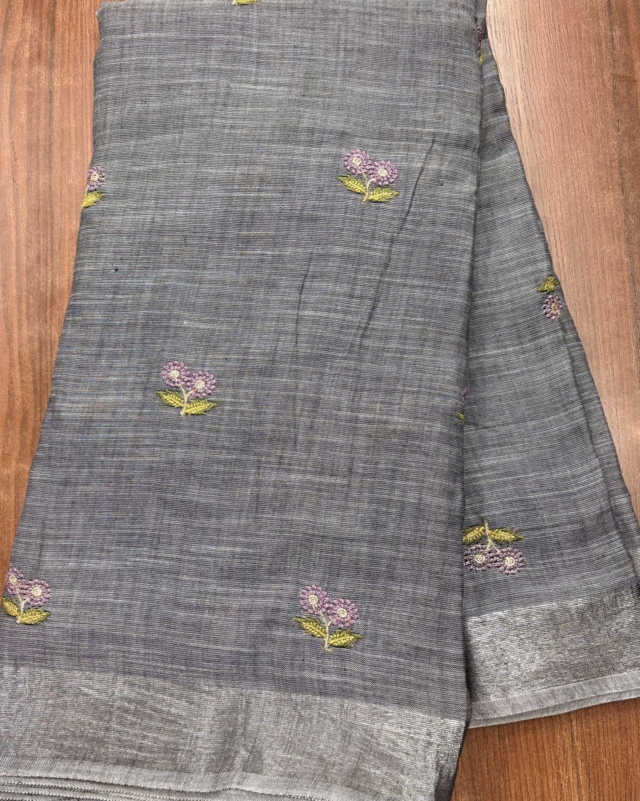 Charcoal linen saree with silver zari border