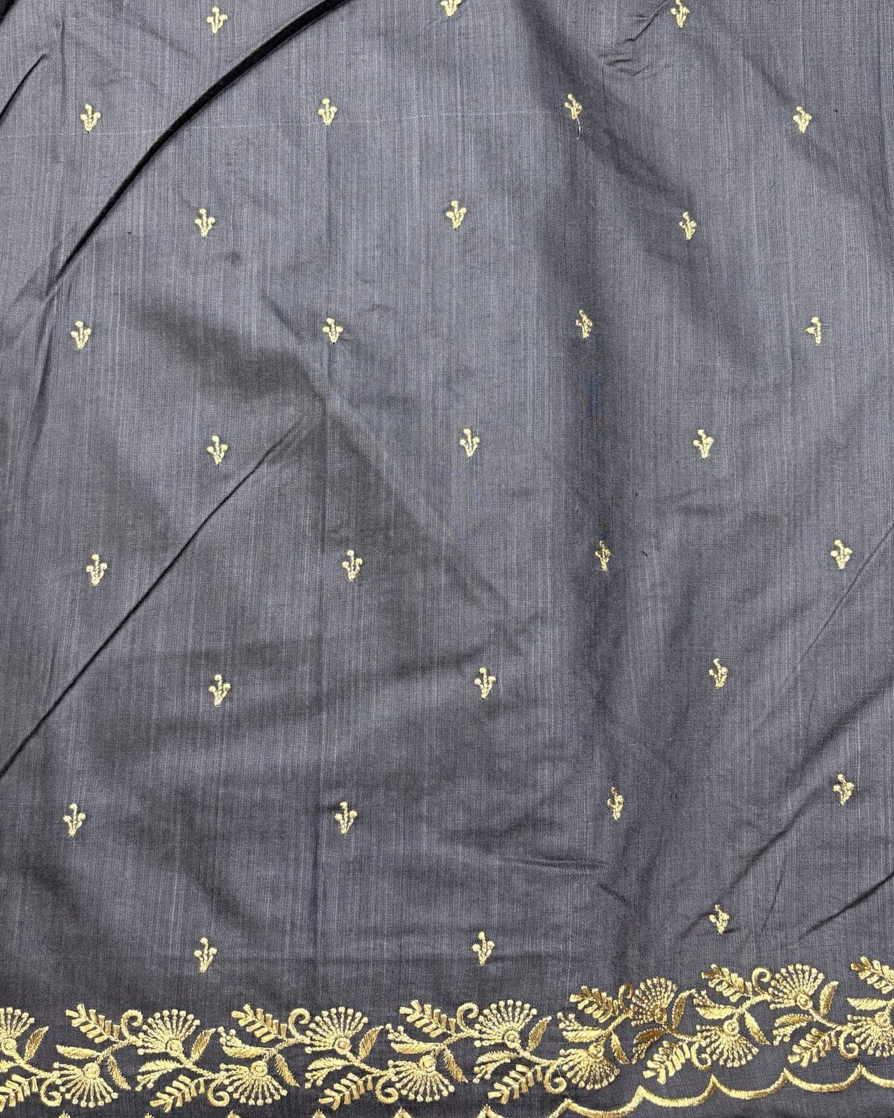 Grey saree with gold zari border